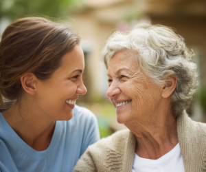 pm24._69818_close-up_of_a_happy_elderly_woman_and_a_caregiver_99d55964-16a9-4b4e-8cb0-11f5d1e47102_3